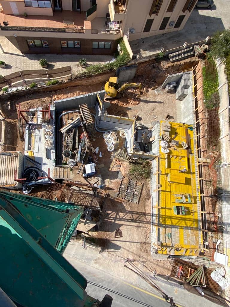 Crane view looking down on building site in Portals Nous